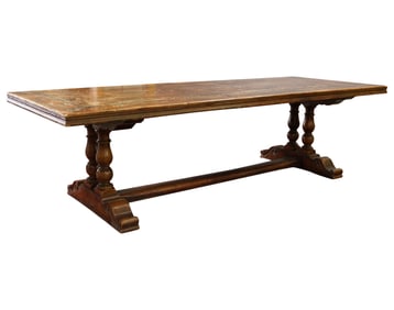 An Antique Carved Wood Trestle Table