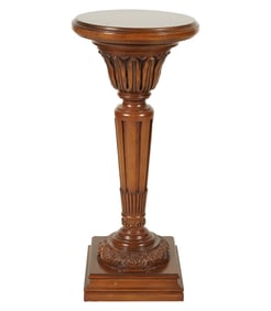 A Walnut Carved Pedestal