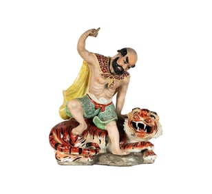 A Chinese Porcelain Group of Man and Tiger