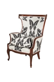 A Louis XV-Style Carved Wood Wing Chair
