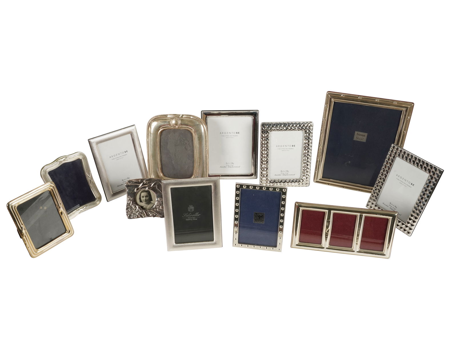 A Collection of Sterling Silver Picture Frames: 12 frames The largest: 11 x 8 1/2 in. (27.9 x 21.6 cm.) Notes: This item does not qualify for in-house shipping. Please see our preferred shippers list for quotes or arrange for local pickup. https://
