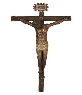 A Large Antique Crucifix: carved and painted wood 77 x 52 1/4 x 15 in. (195.6 x 132.7 x 38.1 cm.) This item does not qualify for in-house shipping. Please refer to our preferred shipper's list at