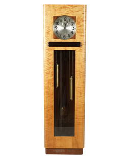 A Junghans Art Deco Grandfather Clock: late 19th century; signed to dial; with three weights and a pendulum 70 1/2 x 19 1/2 x 10 1/2 in. (179.1 x 49.5 x 26.7 cm.) This item does not qualify for in-house shipping. Please refer to our