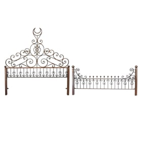 An Antique Spanish Headboard and Footboard
