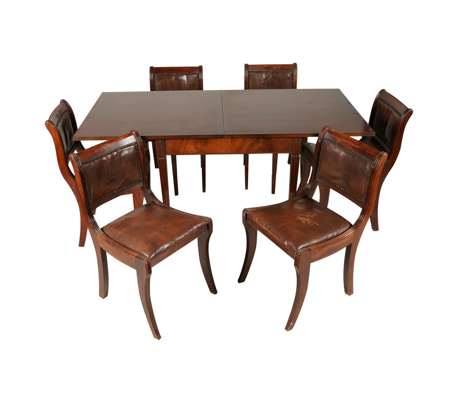 A Mahogany Games / Dining Table and Six Regency-Style Chairs: 20th century; the table with square hinged top inset with gilt-tooled brown leather or faux lather, unfolding to form a dining table seating six (Closed: 31 1/2 x 31 x 31 in., Open: 31 1/2 x 62 x 31 i