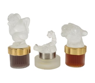 A Group of Lalique Glass Perfumes