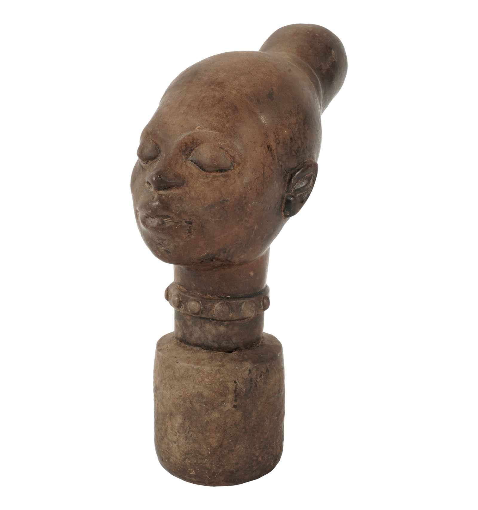 An African Pottery Bust of a Woman: unsigned Overall: 9 in. (22.9 cm.) high