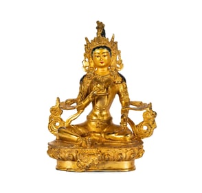 A Tibetan Gilt Bronze Figure of a Seated Buddha