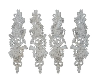 A Set of Four Rococo-Style Painted Wood Appliques