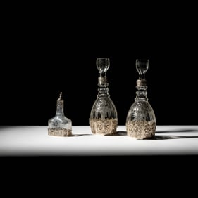 A Pair of German .800 Silver Overlay Glass Decanters