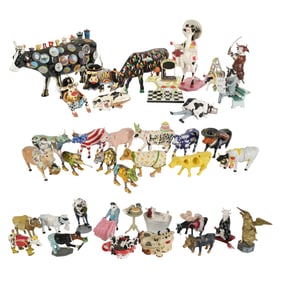 A Collection of CowParade and Other Decorative Painted Cow Figures