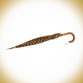 A Louis Vuitton Monogram Umbrella