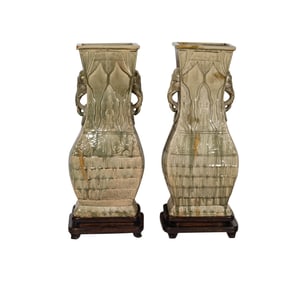 A Pair of Monumental Chinese Celadon-Glazed Urns