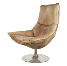 A Restoration Hardware Swivel Lounge Chair