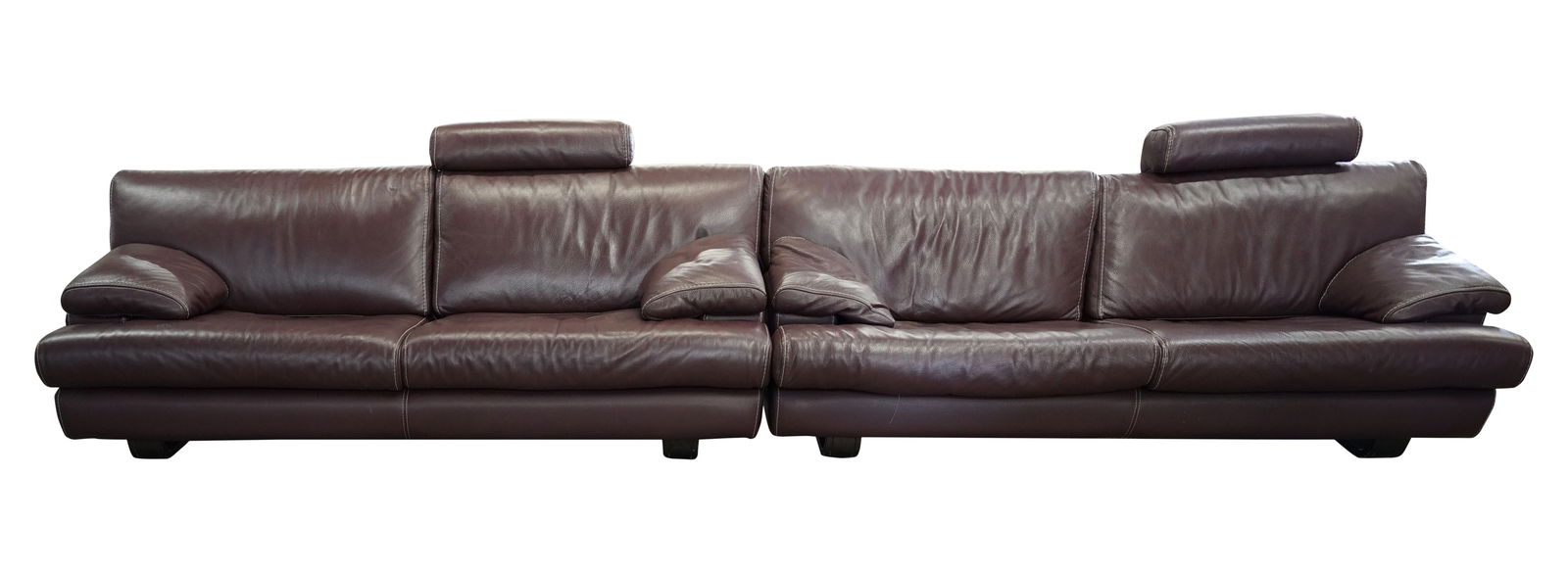 A Pair of Roche Bobois Brown Leather Sofas: with wooden legs 29 x 93 1/2 x 40 in. (73.7 x 237.5 x 101.6 cm.), Seat height: 17 in. (43.2 cm.) Notes: This item does not qualify for in-house shipping. Please see our preferred shippers' list for qu