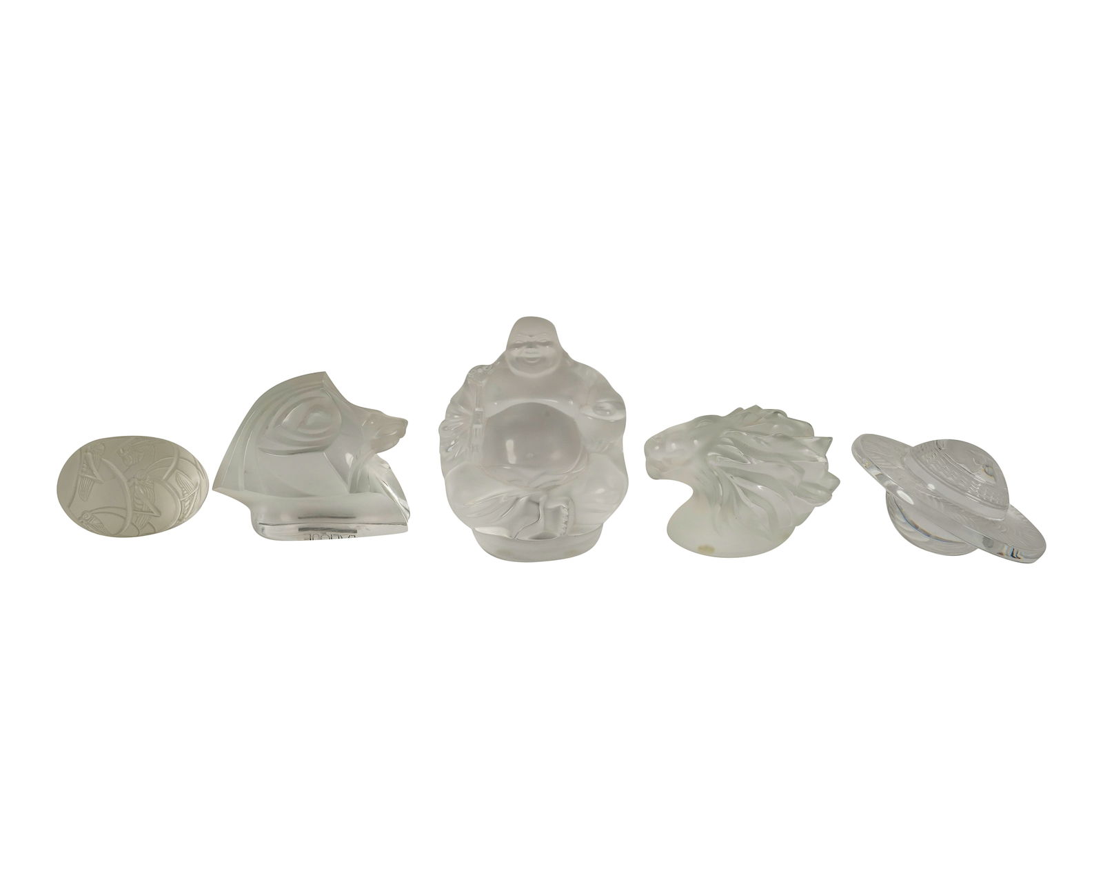 A Group of Lalique Glass Paperweights: comprisng an "Enraged Dragon" (4 in. dia.), a lion's head (2 1/4 in. high), an "Oeuf Grillons" (2 1/2 in. wide), and a "Tete de Lion King" (3 in. high); together with a "Happy Buddha" Figure (3 3/4 in