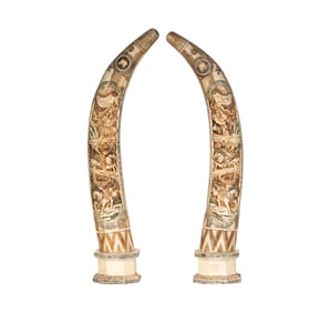 A Pair of Carved and Incised Bones