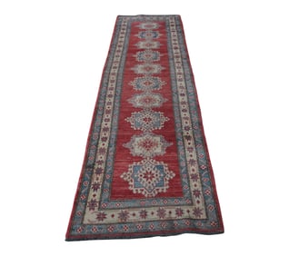 A Persian-Style Runner Rug 9'10" x 2'8"
