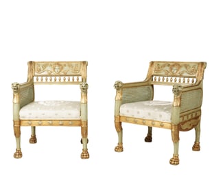 A Pair of Empire-Style Painted and Gilt Armchairs