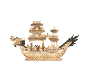 A Carved and Incised Bone Dragon Boat Model