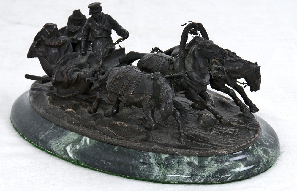 RUSSIAN BRONZE TROIKA GROUP: cast by C.F. Woerffel in St. Petersburg from the model by Vasilii Grachev on an oval marble plinth signed on base in Cyrillic GRACHEV and stamped with foundry mark FABR. C.F. WOERFFEL. PETERSBURG' 10