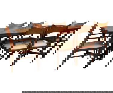 An American Mid-Century Modern Dining Set: comprising a table (Closed: 29 x 64 x 40 in.) with three leaves (Each 15 in. wide) two armchairs (33 3/4 x 23 3/4 x 20 in., Seat height: 17 in.), and four side chairs(33 1/2 x 18 x 20 in.)Notes: This