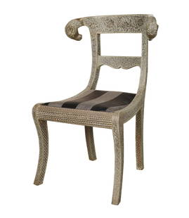 An Anglo-Indian Ram's Head Side Chair: metal-clad wood, fabric33 1/2 x 22 1/2 x 18 in. (85.1 x 57.2 x 45.7 cm.), Seat height: 17 in. (43.2 cm.)Notes: This item does not qualify for in-house shipping. Please see our preferred shippers' list