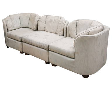 A Vintage Upholstered Sectional Sofa: in three parts; with wooden legsCorner section: 31 x 34 x 34 in. (78.7 x 86.4 x 86.4 cm.), Seat height: 18 in. (45.7 cm.)Notes: This item does not qualify for in-house shipping. Please see our preferr