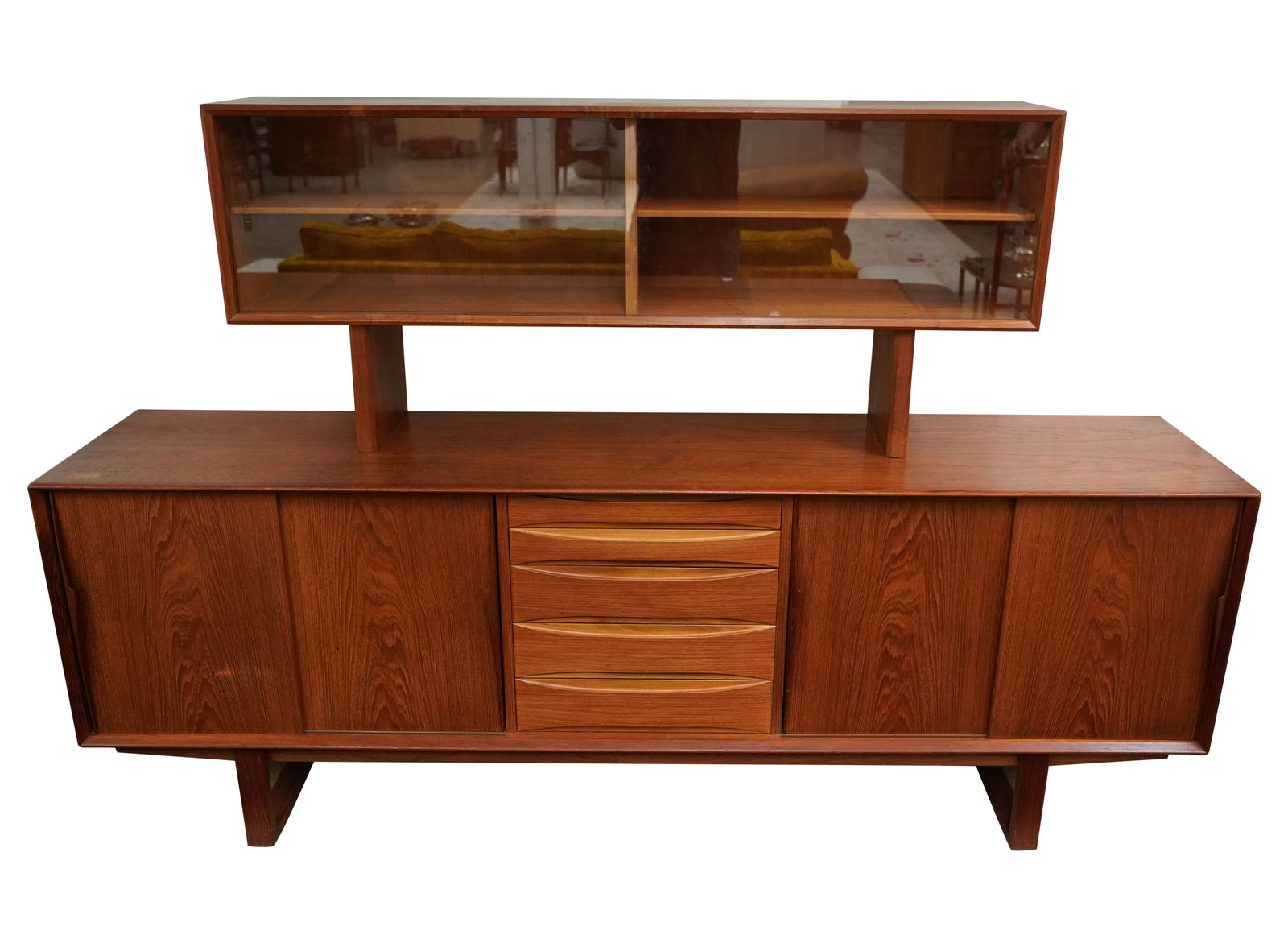 Arne Vodder: Sideboard: teak, glass57 x 86 1/2 x 18 1/2 in. (144.8 x 219.7 x 47 cm.)Notes: This item does not qualify for in-house shipping. Please see our preferred shippers' list for quotes or arrange for local pickup. htt