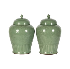 A Pair of Chinese Celadon Porcelain Jars and Covers