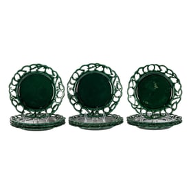 A Set of Twelve Green-Glazed Ceramic Plates