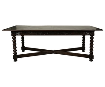 A Stained Carved Oak Dining Table