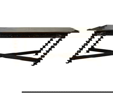 A Stained Carved Oak Dining Table: the parquetry top stained in brown and green, over a foliage-carved frieze on bobbin-turned legs joined by an X-stretcher30 x 86 x 39 in. (76.2 x 218.4 x 99.1 cm.)Notes: This item does not qualify for
