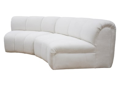 A Channelled Two-Piece Curved Sofa