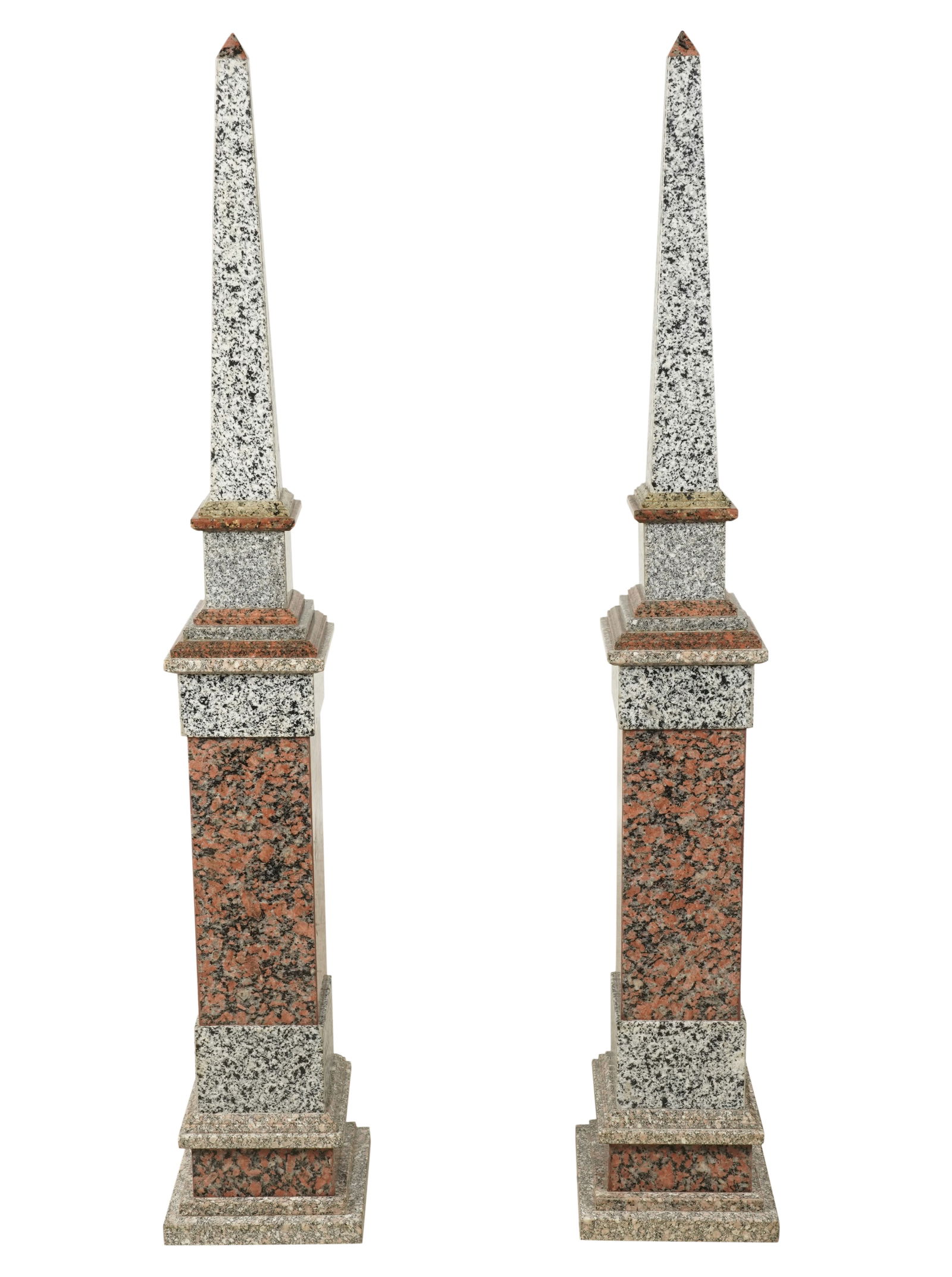 A Pair of Granite Obelisks: contemporary; each constructed in one piece61 x 10 1/2 x 10 1/2 in. (154.9 x 26.7 x 26.7 cm.)Notes: This item does not qualify for in-house shipping. Please see our preferred shippers list for quotes