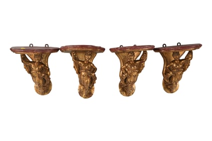 A Set of Four Carved Giltwood Figural Wall Brackets