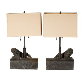A Pair of Chinese Carved Stone Foo Dog Figures
