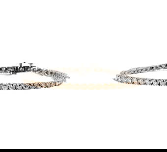 18 Karat Oxidized Gold and Colored Diamond Bracelet: set with 52 full-cut Light Brown diamonds weighing approximately 5.65 carats; measuring 6-1/2 inches long by 2.94mm wide, weighing 11.3 grams;