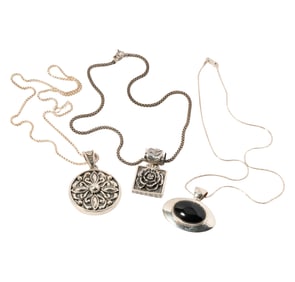 Three Assorted Sterling Silver Pendants on Silver Chains