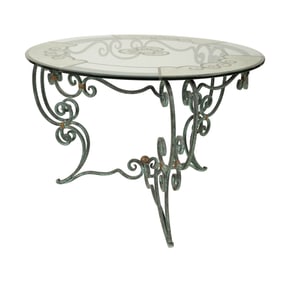 A Patinated Iron and Glass Occasional Table