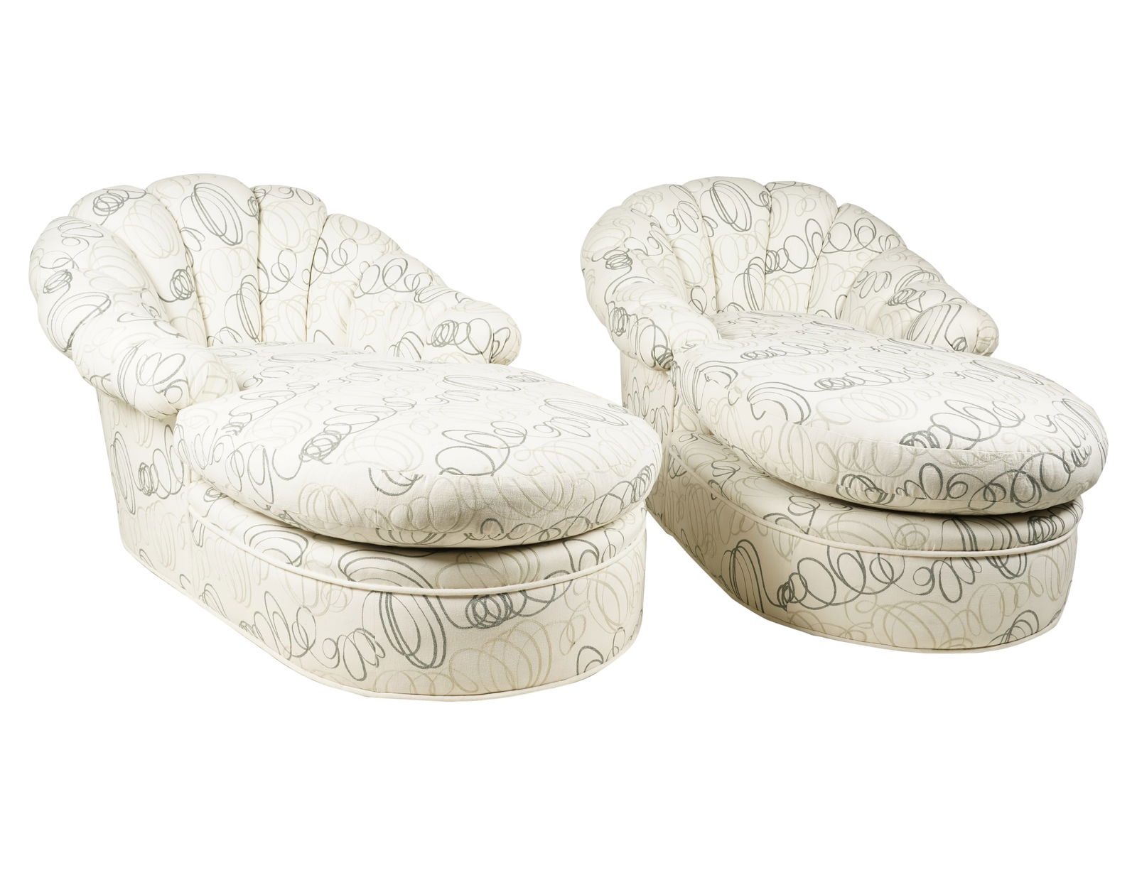A Pair of Upholstered Channel Back Chaise Lounges: contemporary; covered with white fabric with stitched designs in dark and pale green35 x 40 x 67 in. (88.9 x 101.6 x 170.2 cm.), Seat height: 17 in. (43.2 cm.)Notes: This item does not qualify for in-