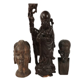 A Group of Three Figural Wood Carvings