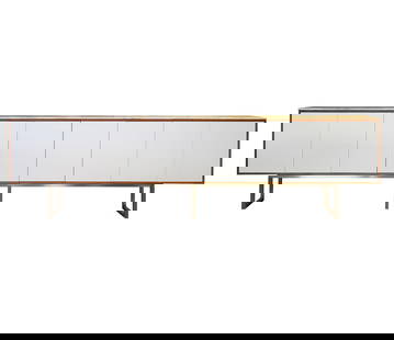 A Modernist Credenza: contemporary; with onyx or engineered stone waterfall top over a wood and metal frame with four pairs of white laminate doors42 1/2 x 157 x 16 in. (108 x 398.8 x 40.6 cm.)Notes: This item does not qua