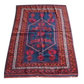 A Red and Blue Turkish or Persian Rug 5'8" x 3'6"
