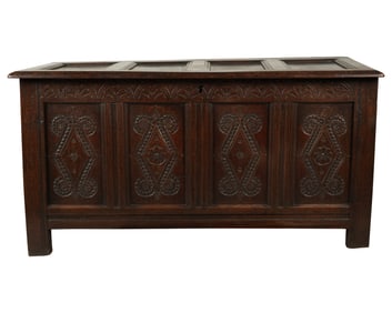 An Antique English Carved Oak Blanket Chest