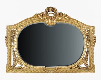 A Continental Baroque-Style Carved Giltwood Mirror