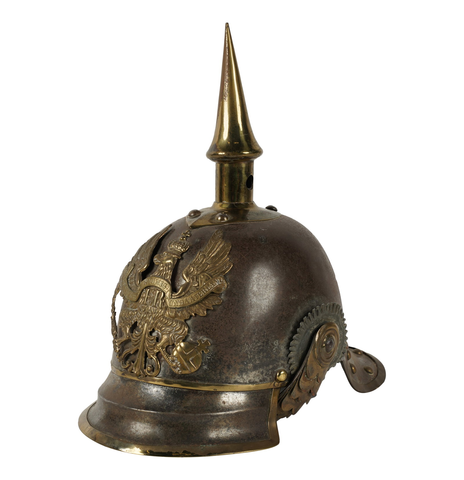A Prussian Helmet from the Collection of Billy Wilder: 19th century; with Louis Stern Galleries label with printed inscription "Billy Wilder / Prussian Helmet Captured by the French in 1871, later used as a mobile bidet / assemblage / 14 x 7 x 13 inches"1