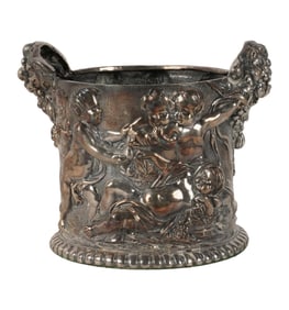 A Sterling Repousse Wine Coaster