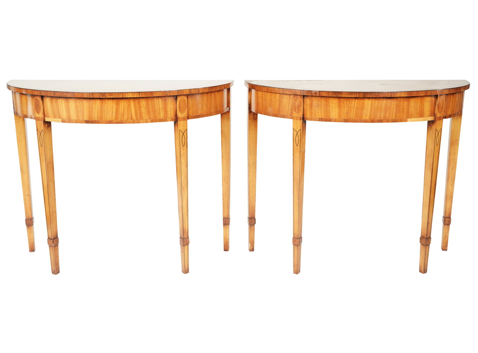 A Pair of Neoclassical-Style Demilune Console Tables: probably English; with inlay29 x 36 x 14 3/4 in. (73.7 x 91.4 x 37.5 cm.)Notes: This item does not qualify for in-house shipping. Please see our preferred shippers' list for quotes or arrange for loca