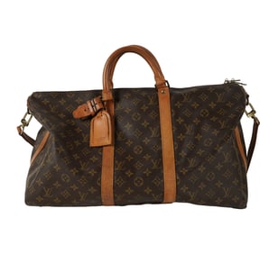 A Louis Vuitton Monogram Canvas Weekender Bag